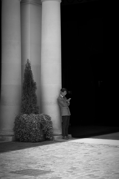 A spot in Covent Garden where I once caught a woman smoking, I still pause here whenever I pass, watching for someone to occupy it. Used this one to experiment with darktable masking, so the edit is a little rough.<hr>London Walk (2026)